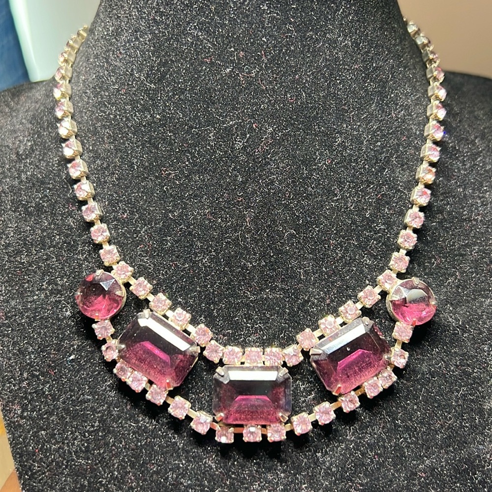 Vintage purple glass and rhinestone necklace glows under 395 black light…
